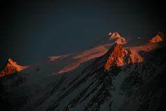 Manaslu 09 11 Manaslu Summit Plateau Close Up At Sunset From Bimtang Here�s another extremely close up view from Bimtang at sunset of the summit plateau of Manaslu with the East Pinnacle (7992m) on the left and the summit to the right.